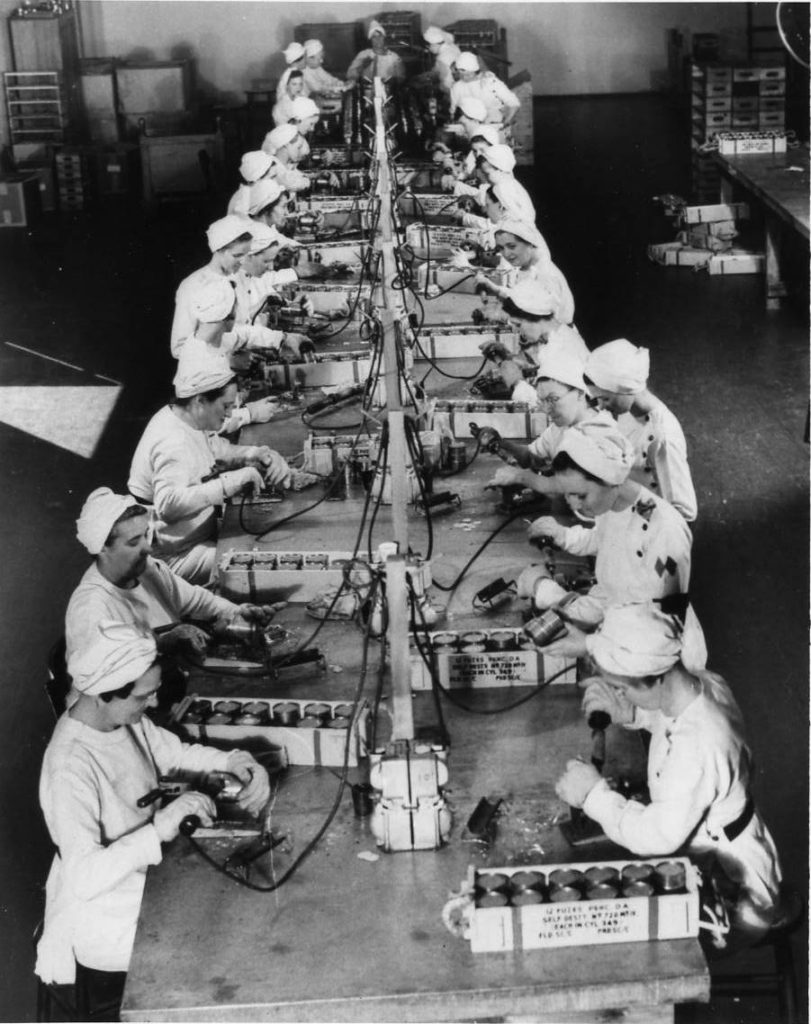 Canadian Bomb Girls Soldering Fuse Tins at GECO in Scarborough, Ontario